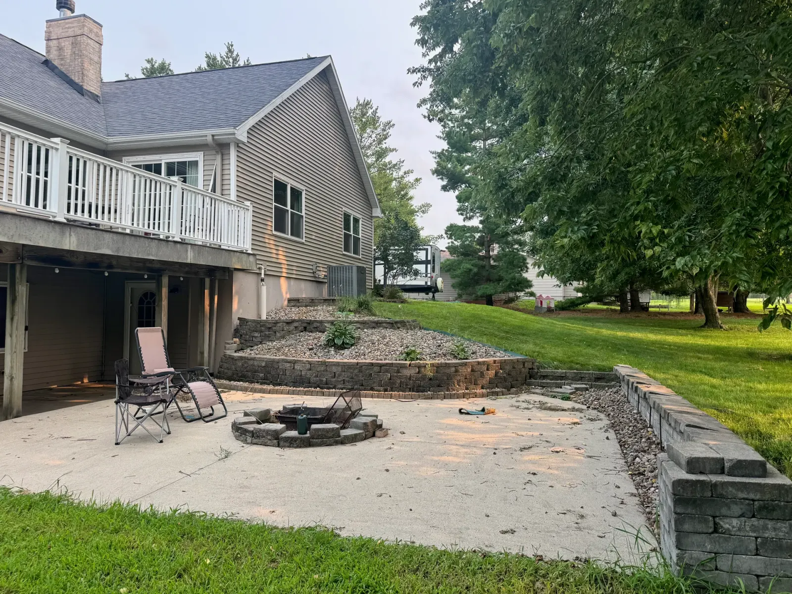 10908 NW 107th Street, Granger, Iowa - Fire Pit And Stone Retaining Wall