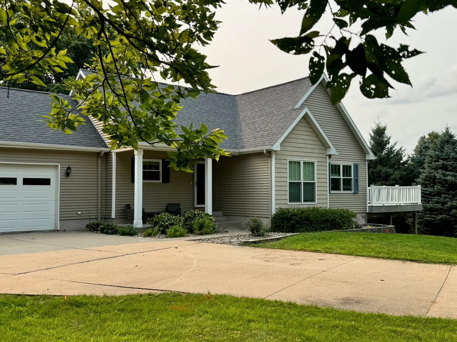 10908 NW 107th Street, Granger, Iowa - Front Framed By Trees